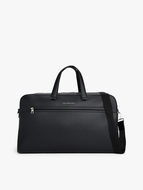 حقيبة قماشية محبوكة مزينة بشعار معدني