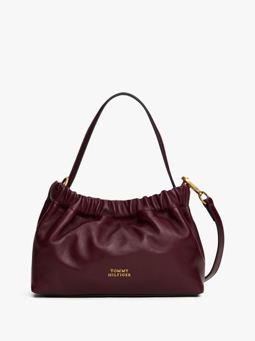 حقيبة كروس بدي جلدية مزينة بلوحة معدنية للشعار