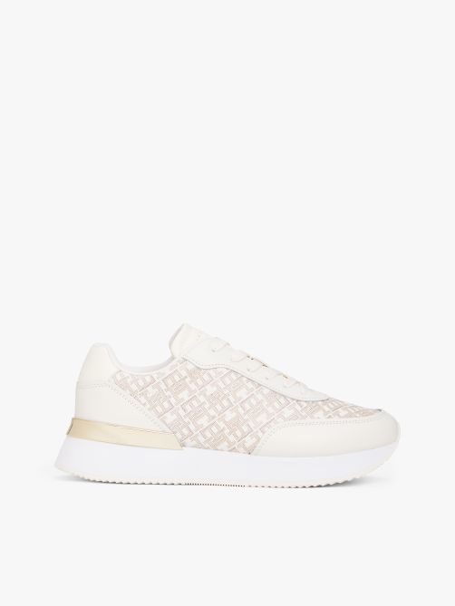 حذاء سنيكرز جلدي مزين بحروف الشعار