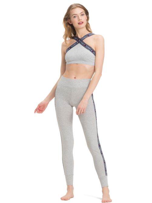 بنطال ملاصق للجسم بشريط الشعار على الجوانب