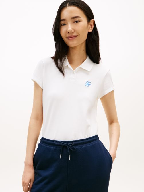 قميص بولو بيكيه ضيق مطرز بالشعار من مجموعة 1985