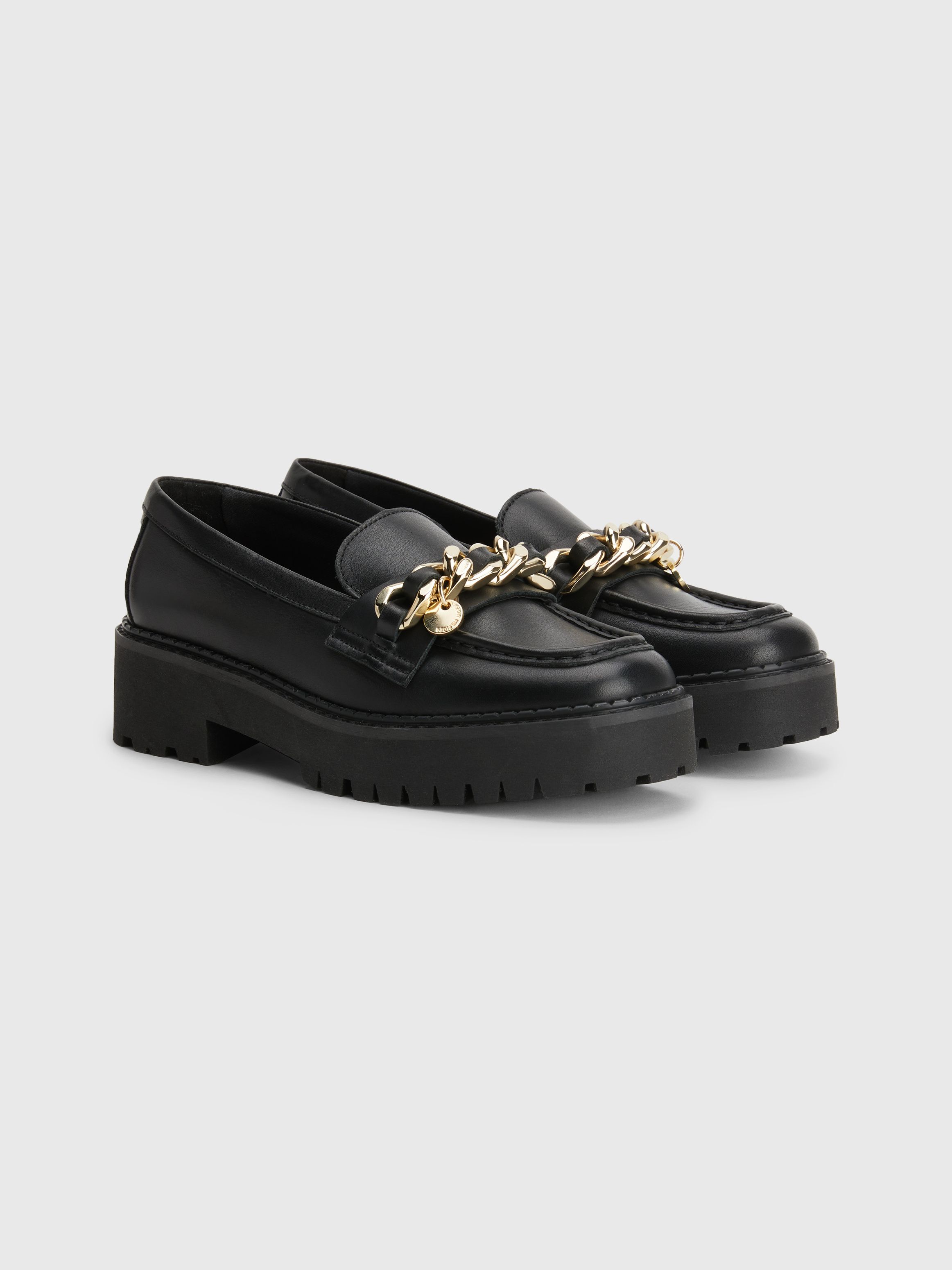 tommy hilfiger cleated chunky sole mules in white