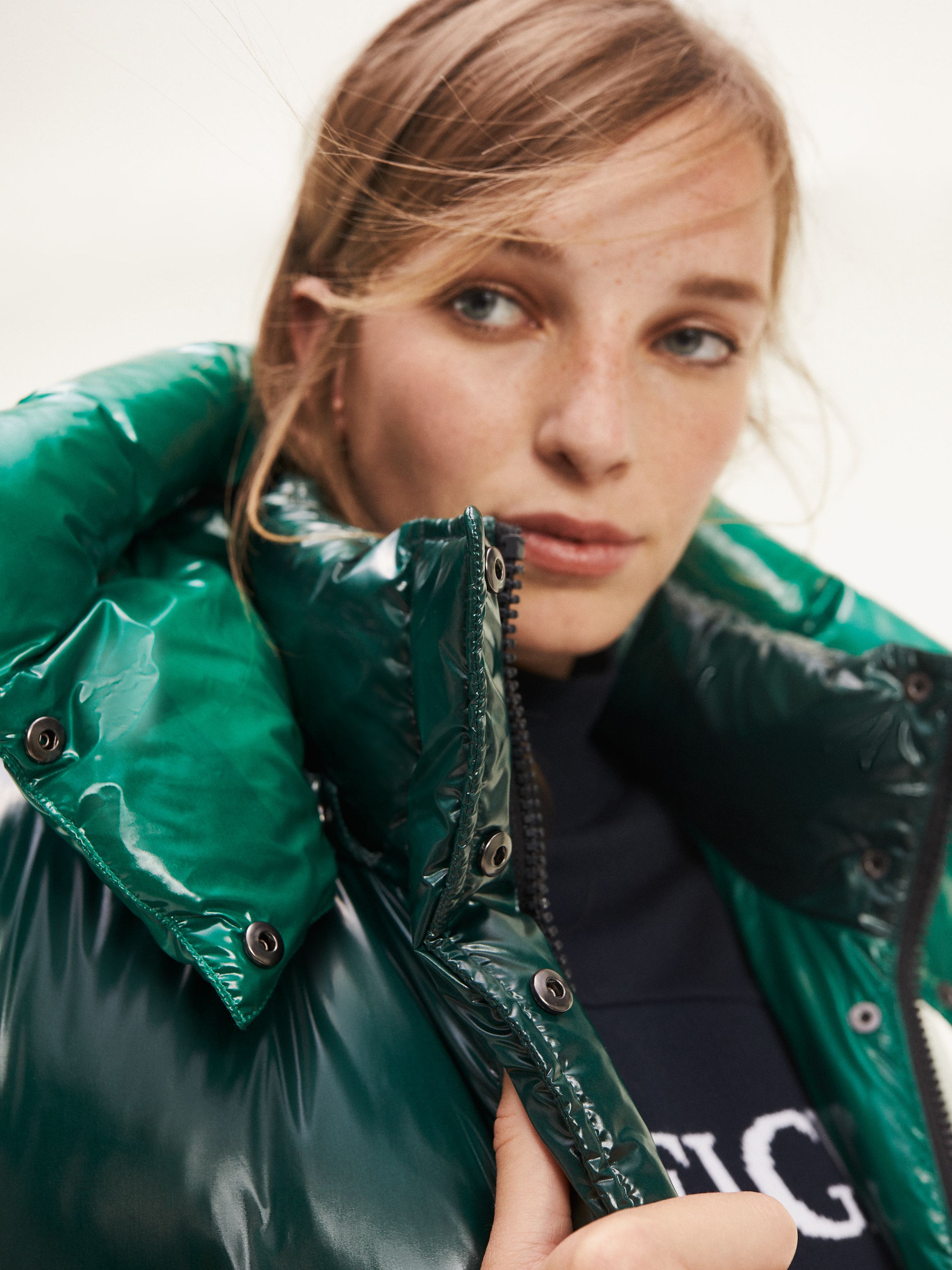 green shiny jacket
