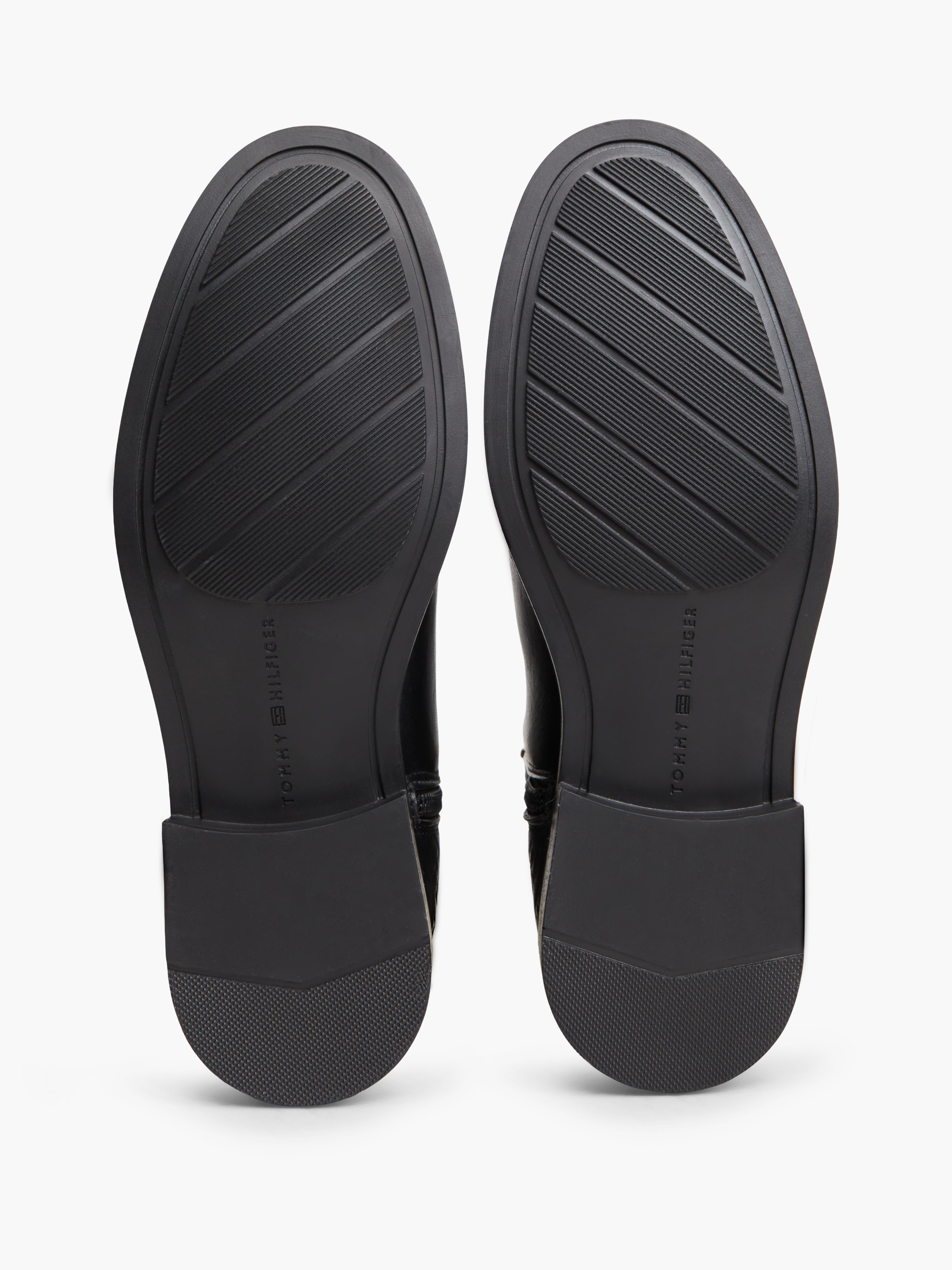 TH Monogram Embossed Leather Ankle Boots