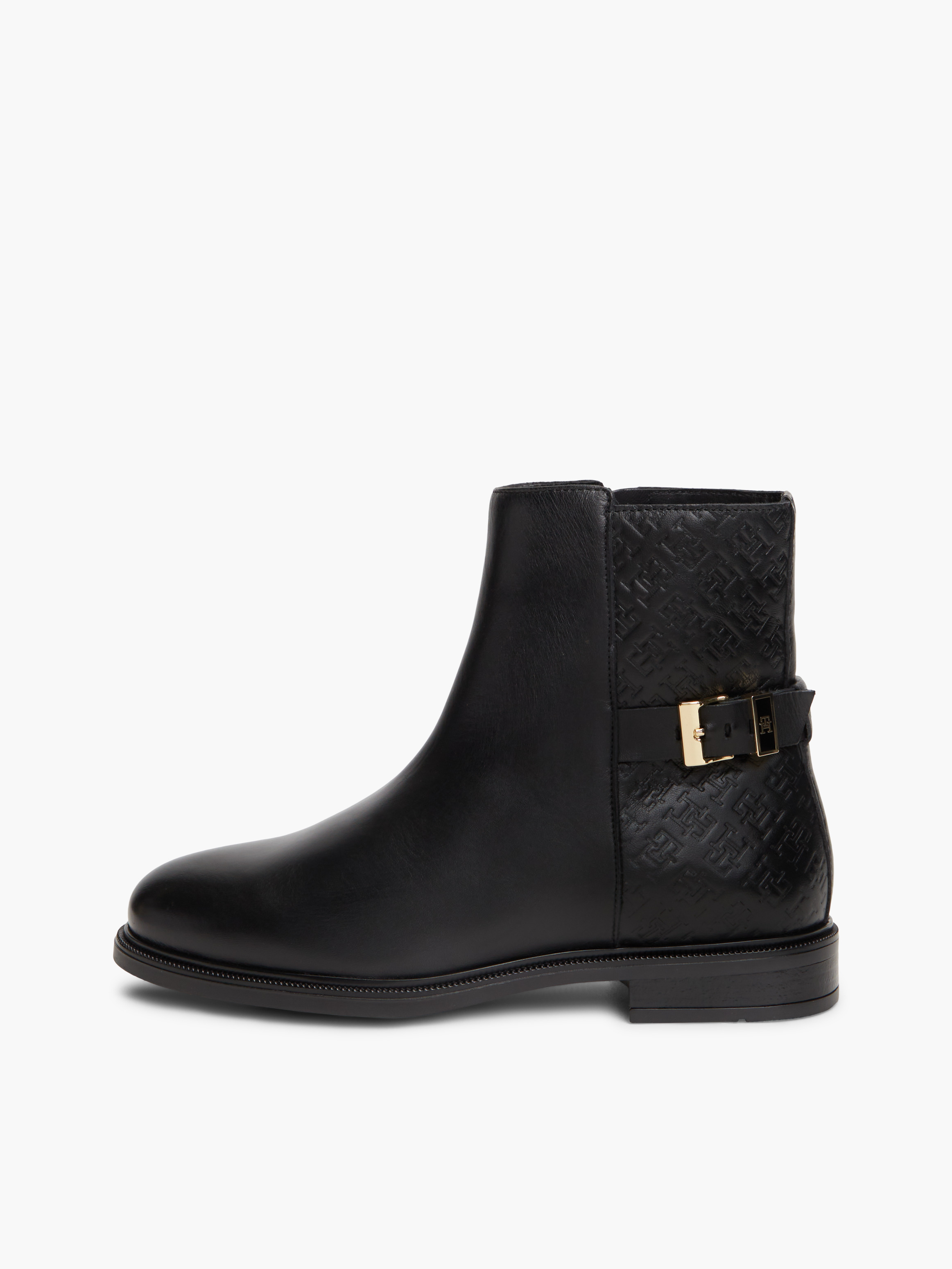 TH Monogram Embossed Leather Ankle Boots