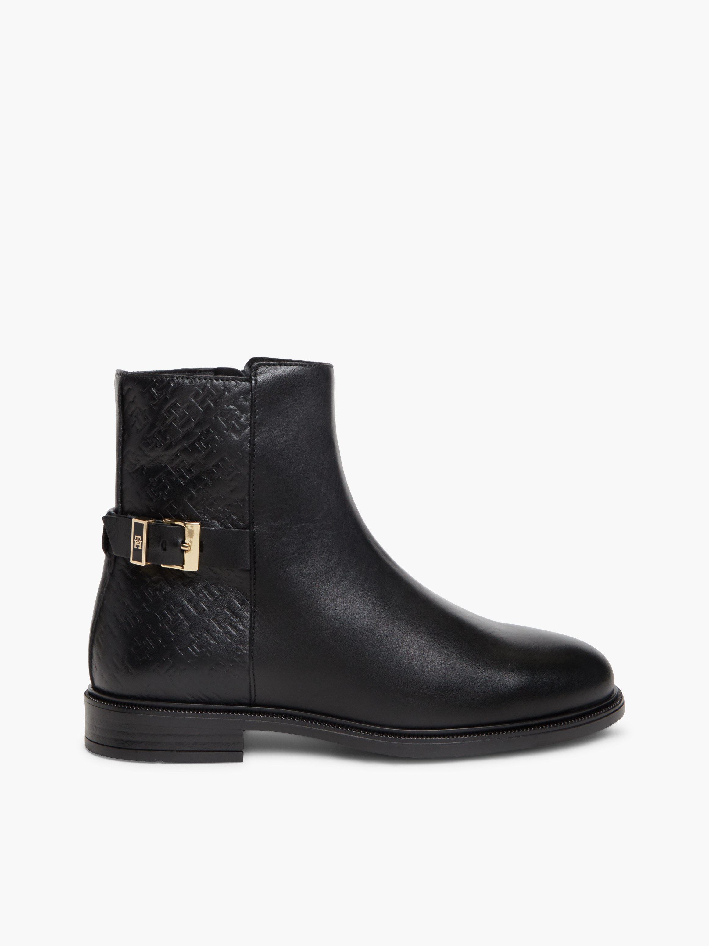 TH Monogram Embossed Leather Ankle Boots